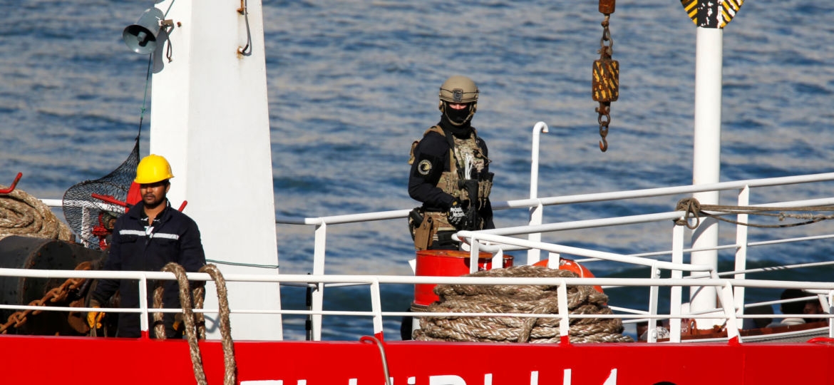 A Maltese special forces soldier is seen on the merchant ship Elhiblu 1 after it arrived in Senglea