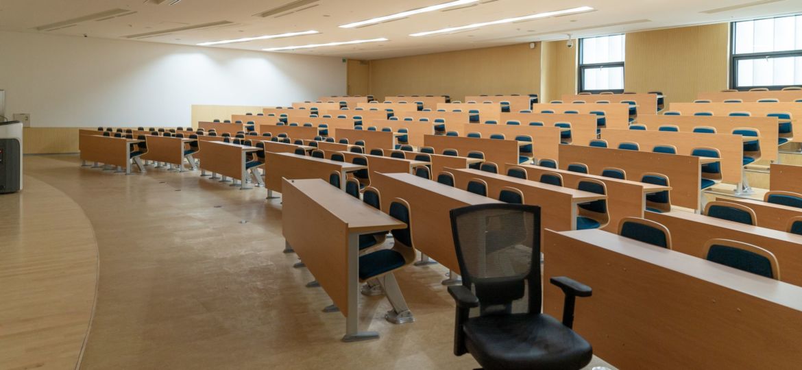 università